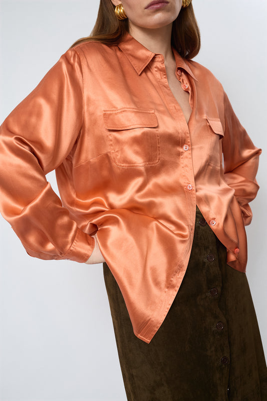 Bright orange blouse