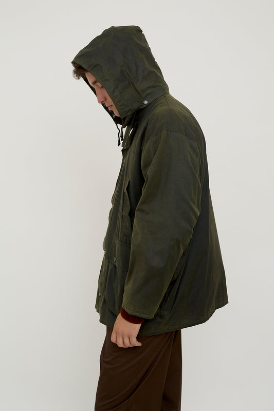 Waxed rain jacket with padding