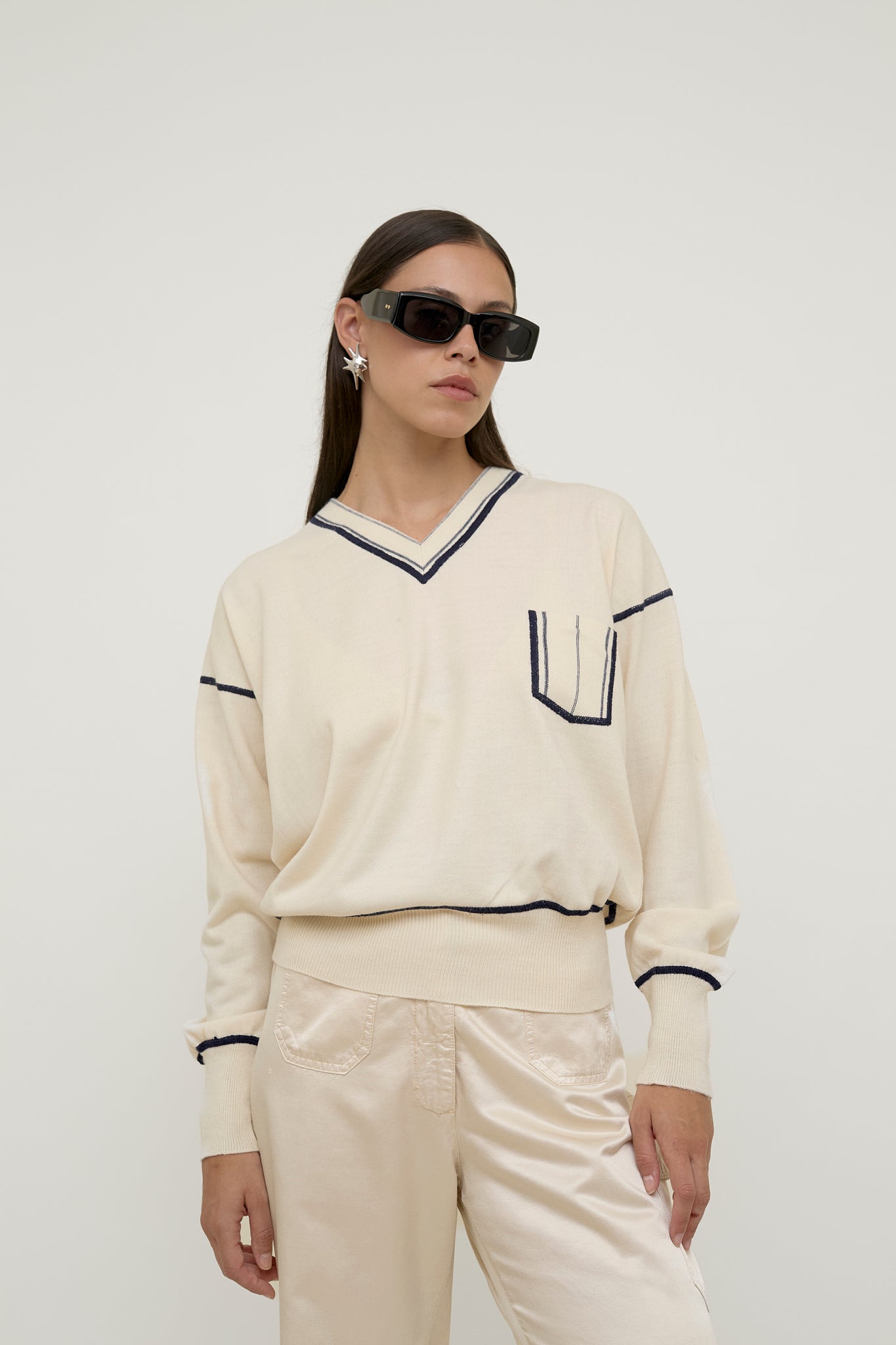 Uniform style jumper with pocket