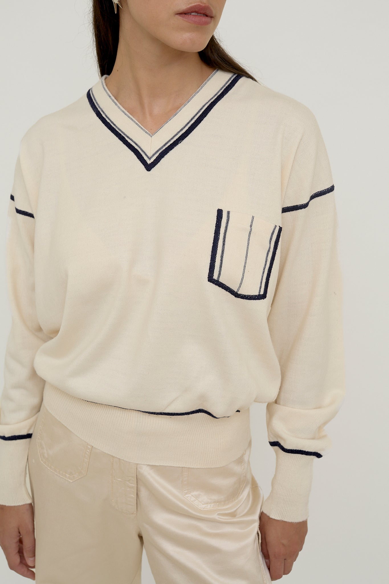 Uniform style jumper with pocket