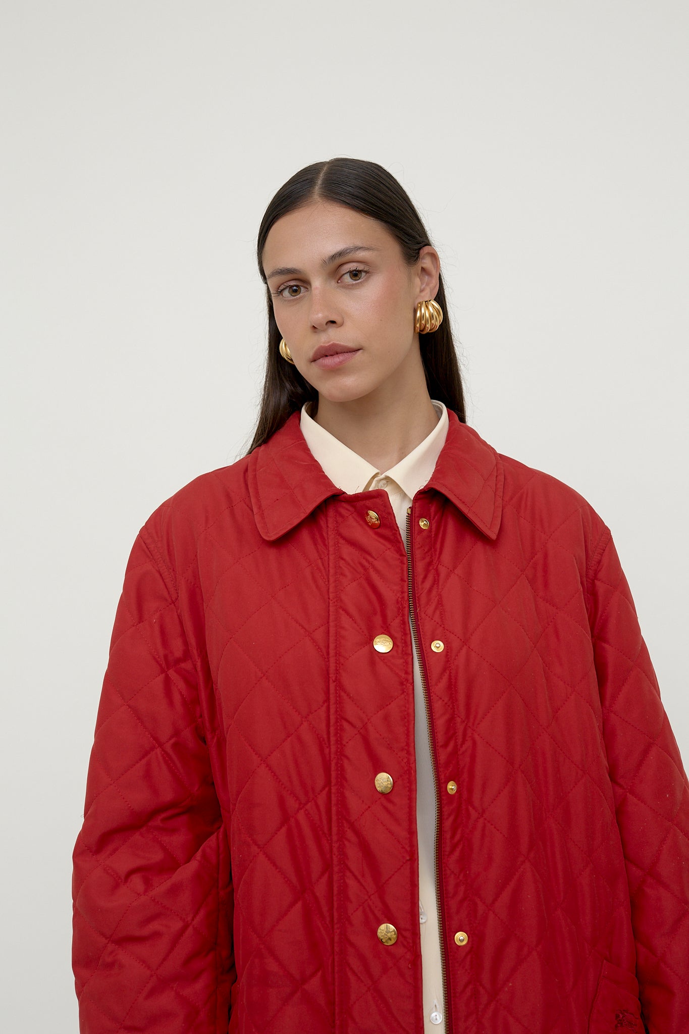 Red quilted Burberry jacket