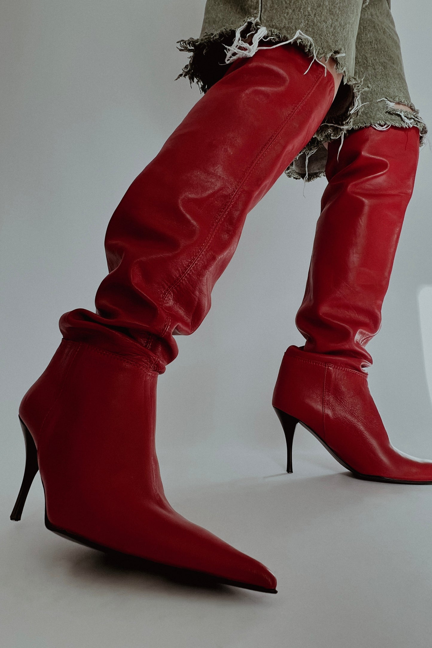 Knee-high heeled leather boots