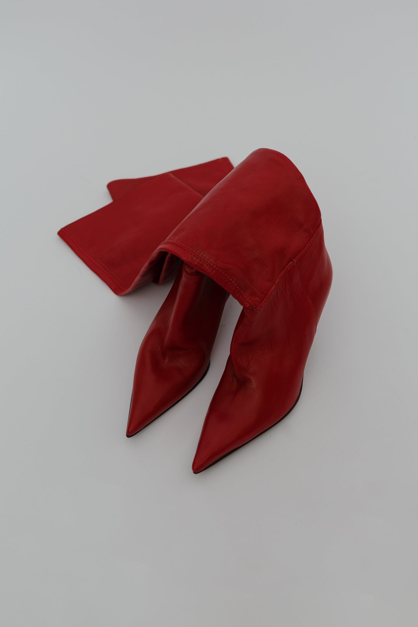 Knee-high heeled leather boots