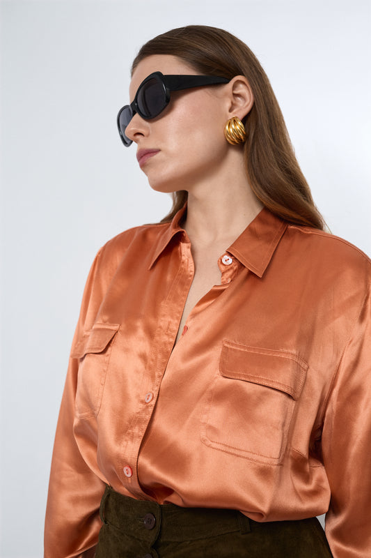 Bright orange blouse