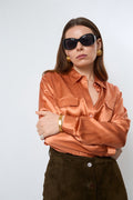 Bright orange blouse
