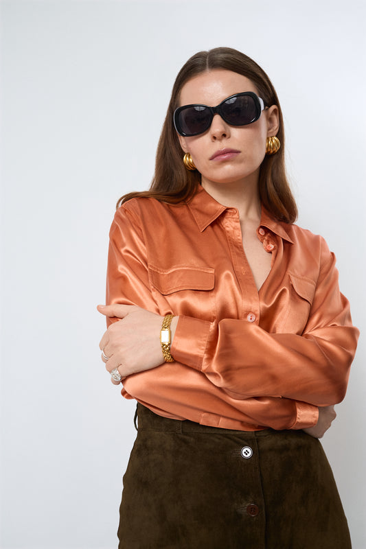 Bright orange blouse