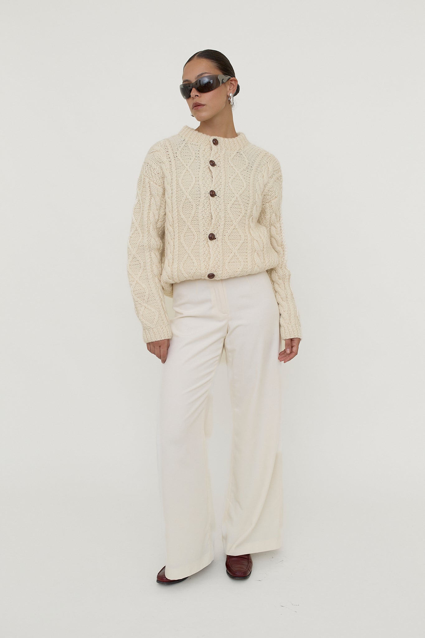 Cable knit button-front cardigan