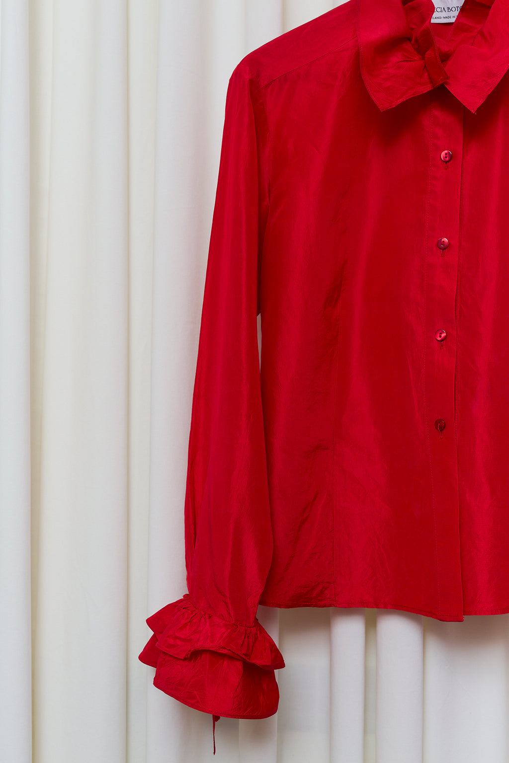 Red silk statement blouse