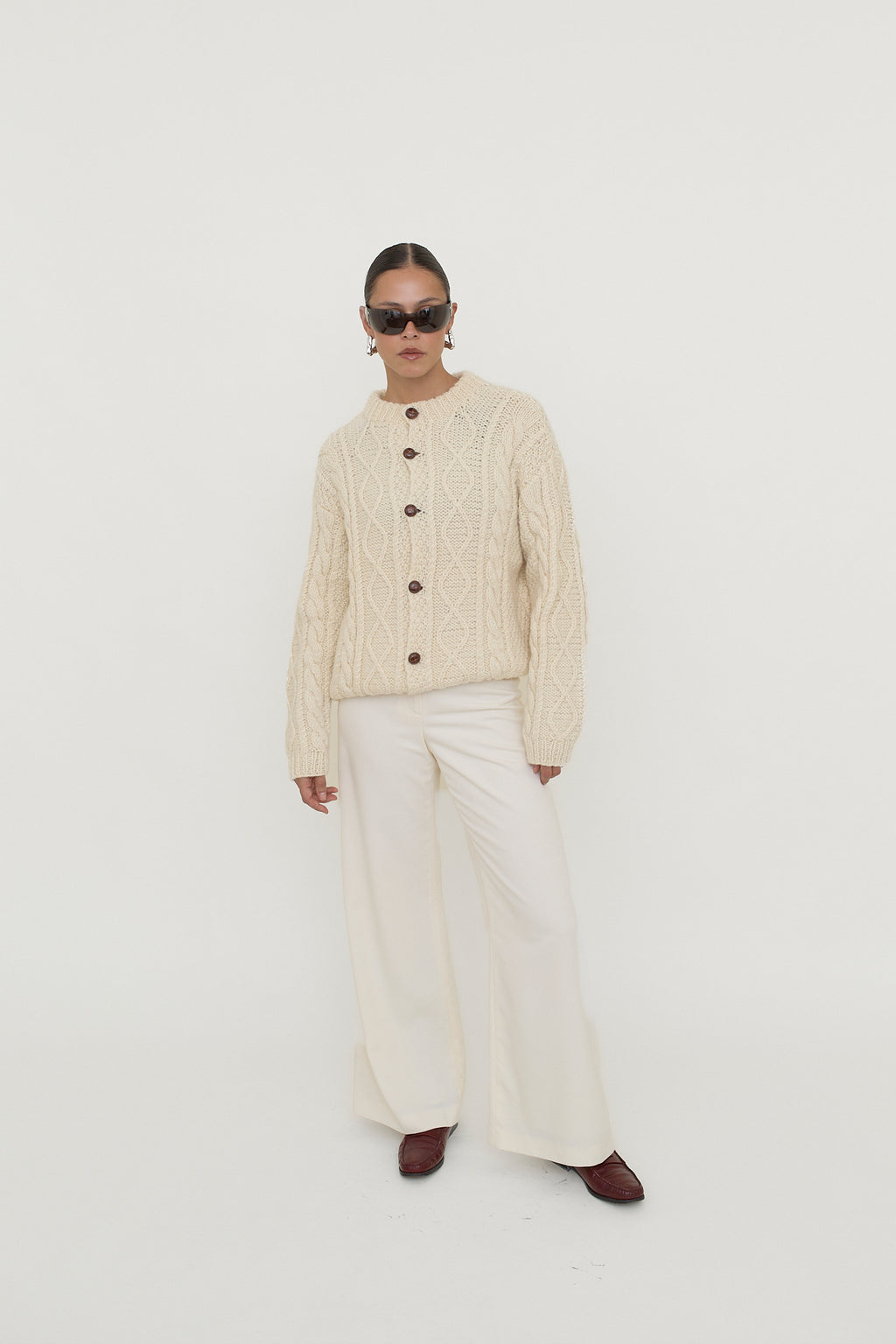 Cable knit button-front cardigan