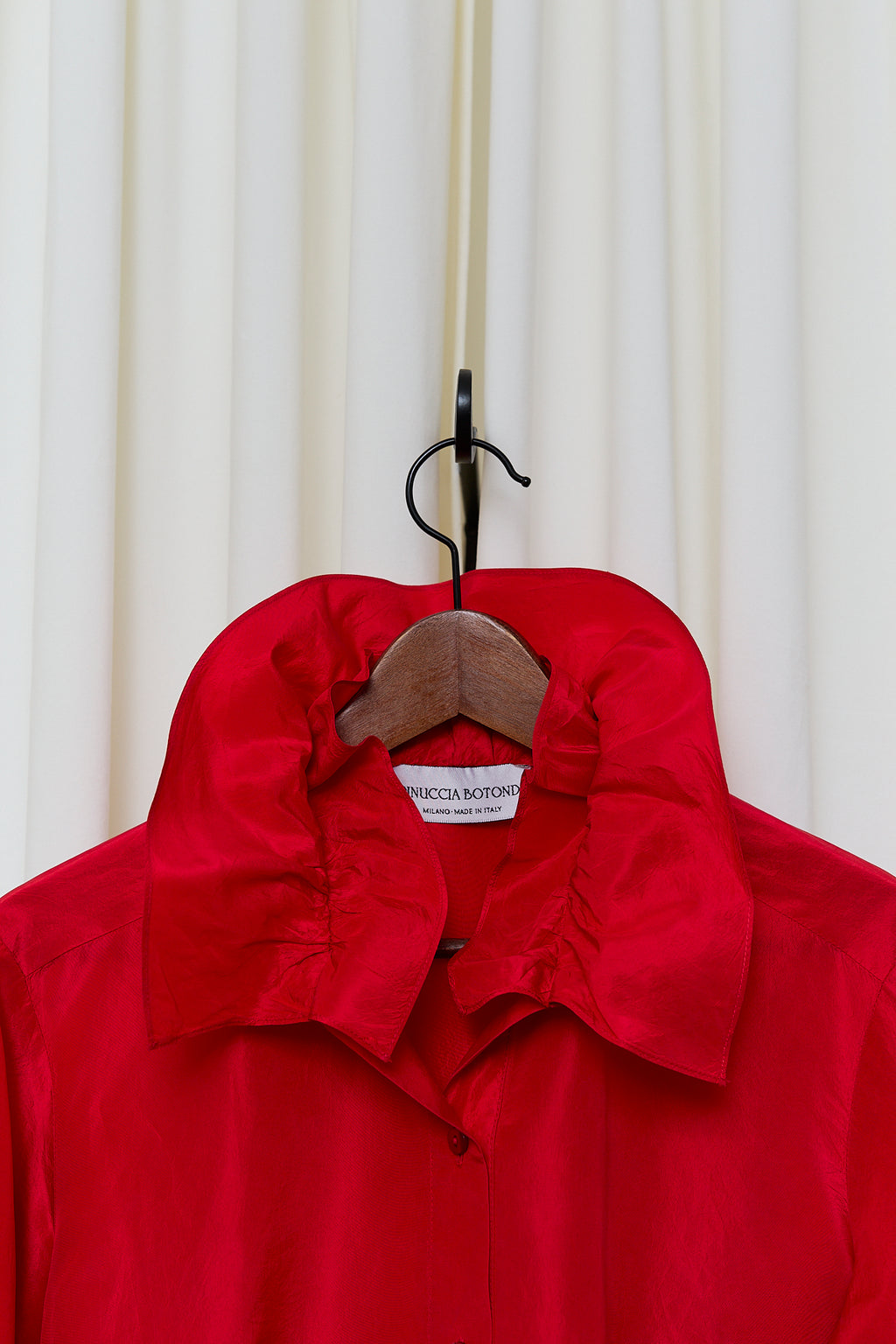 Red silk statement blouse
