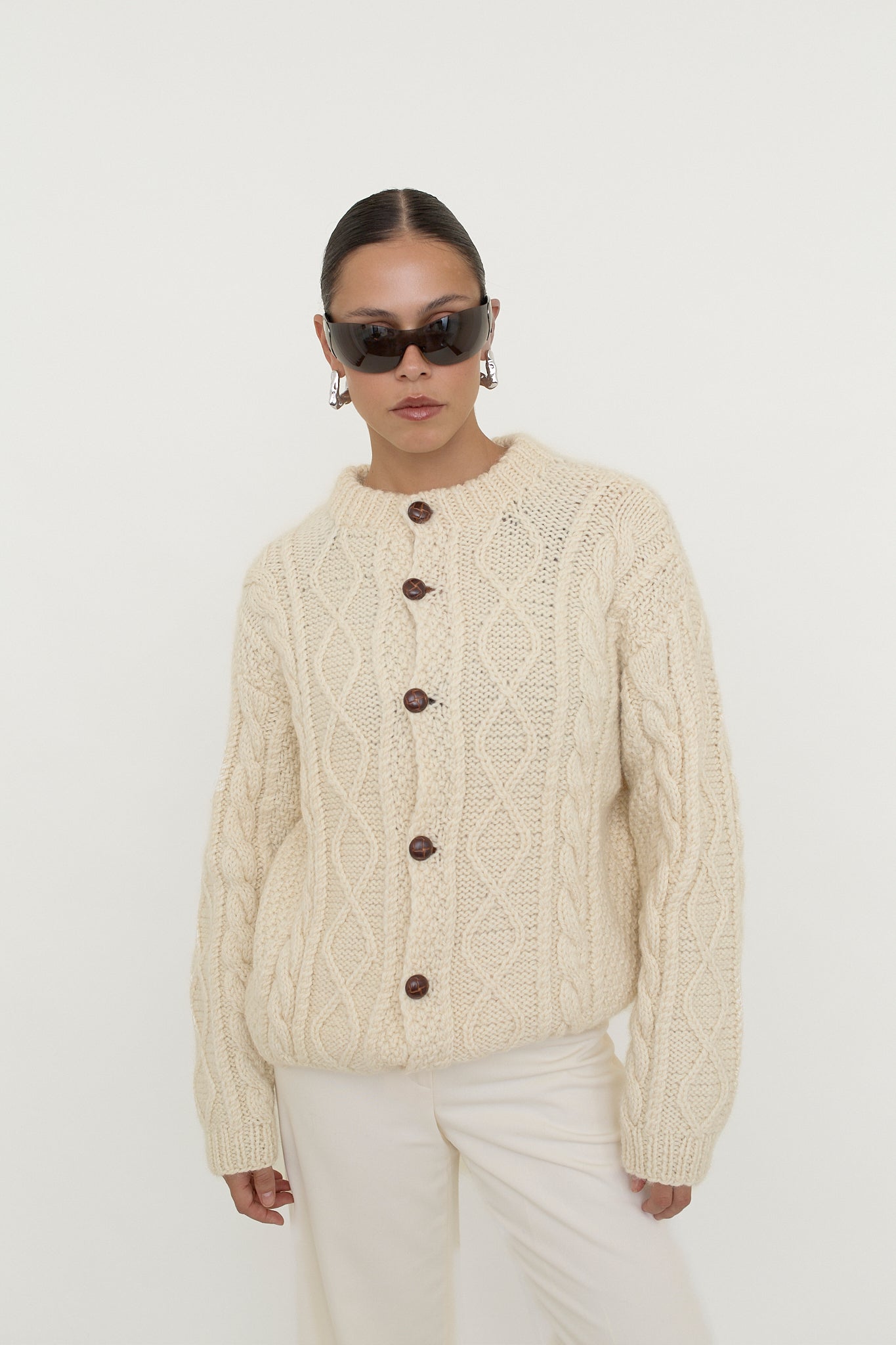 Cable knit button-front cardigan