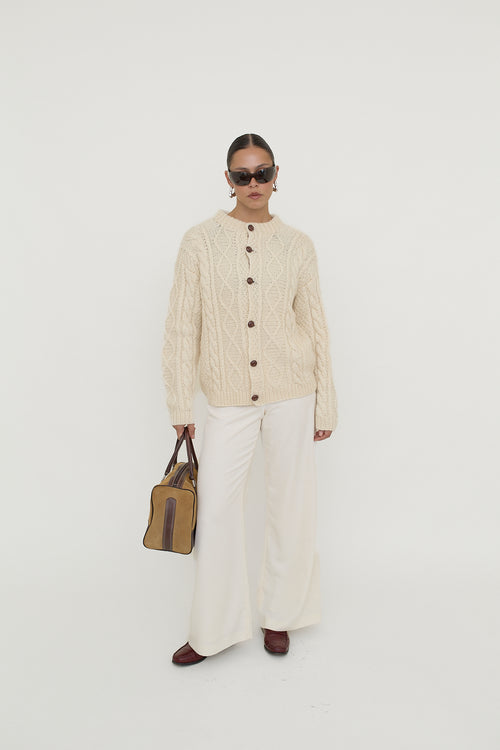 Cable knit button-front cardigan
