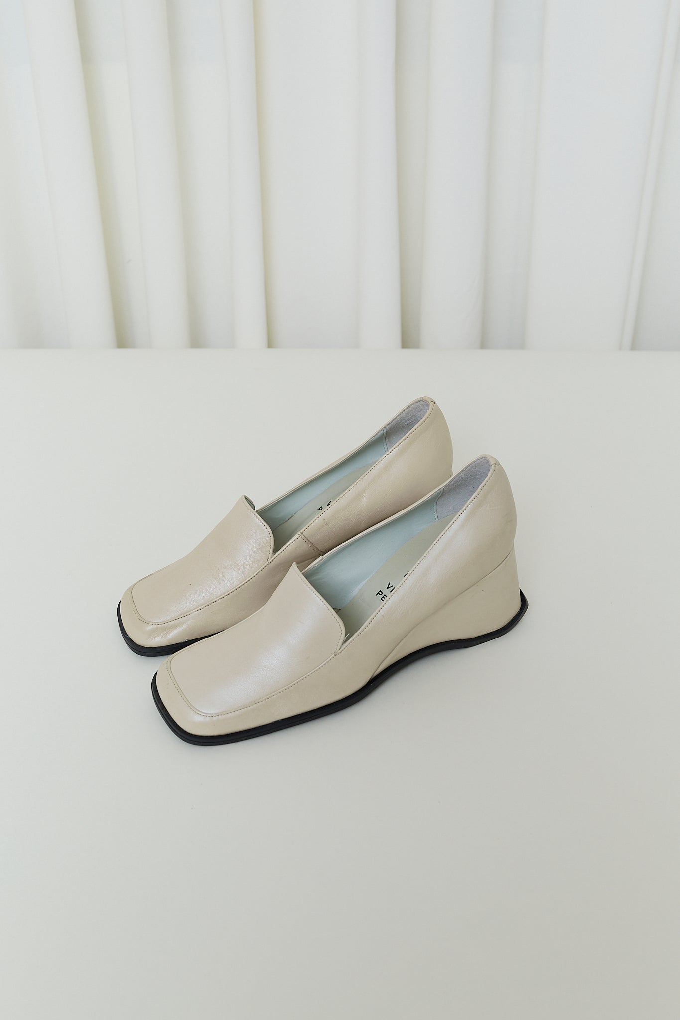 Cream leather wedge loafers