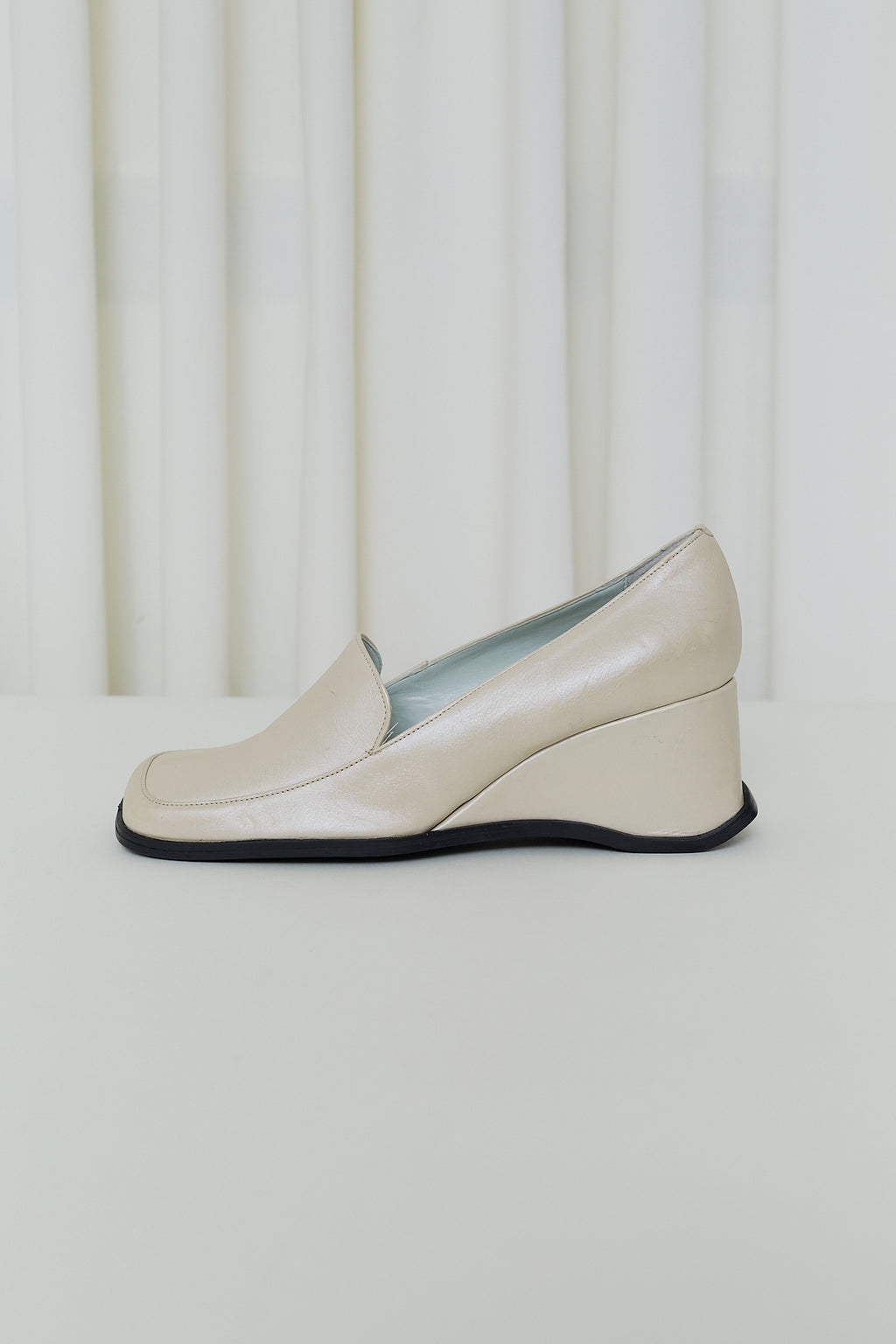 Cream leather wedge loafers