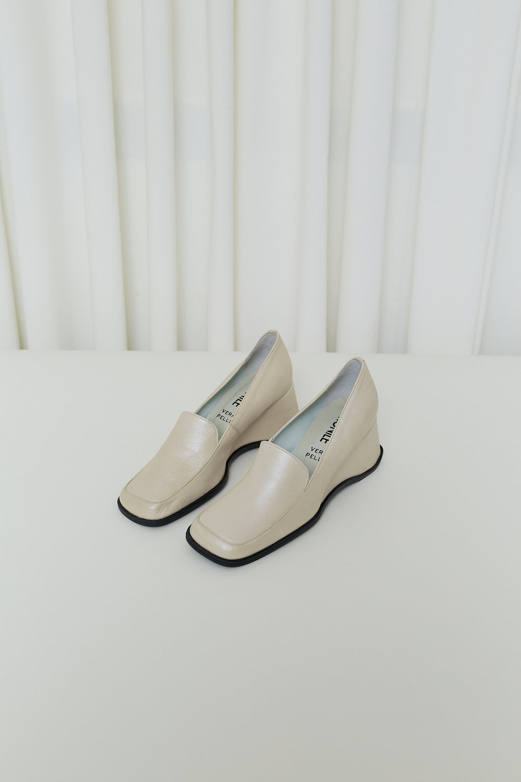 Cream leather wedge loafers