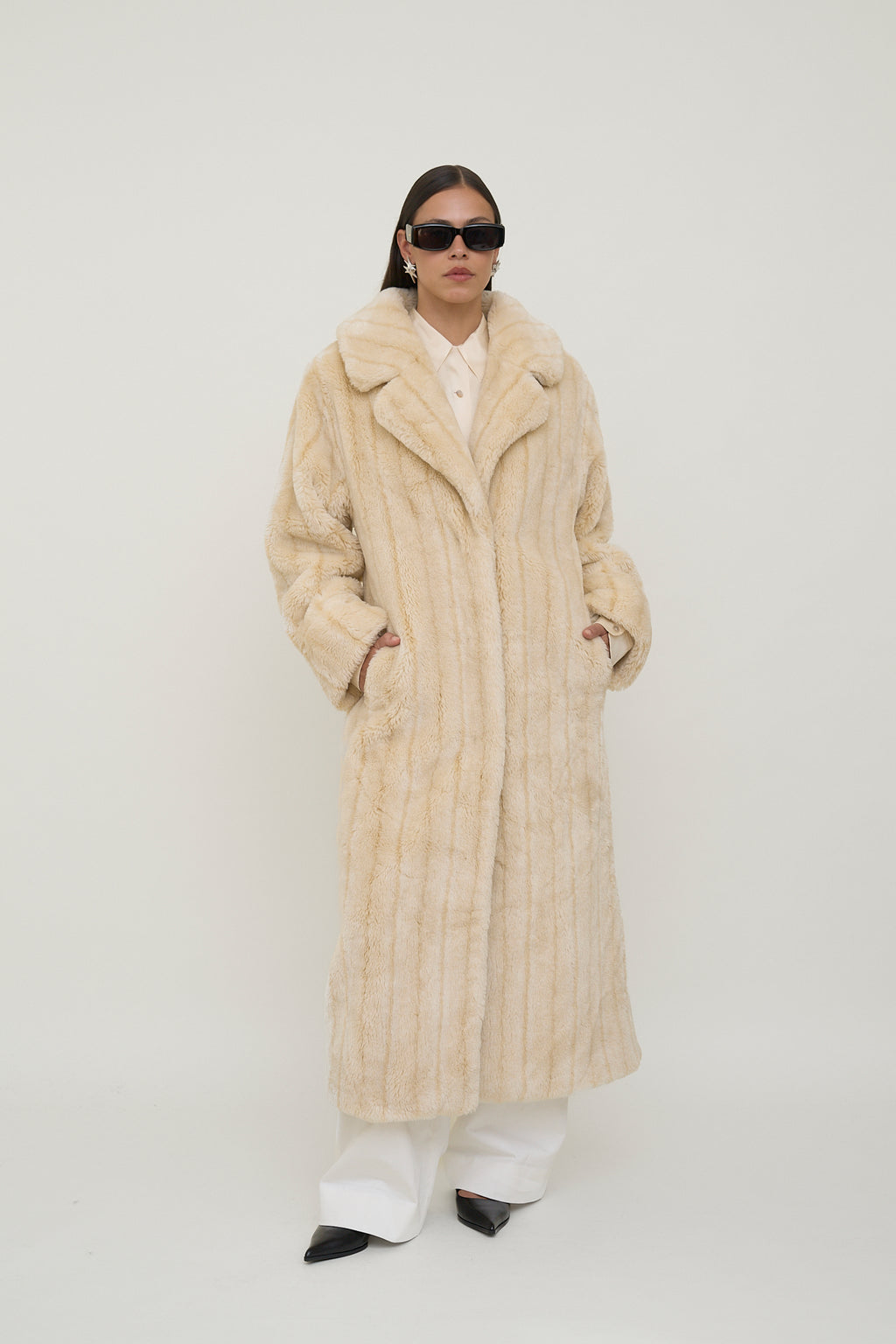 Plush faux fur statement coat