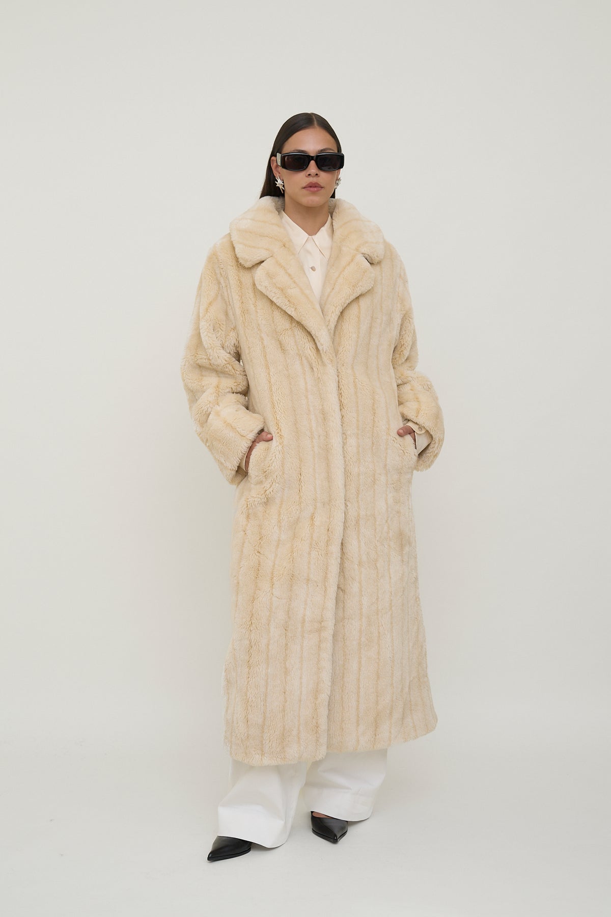 Plush faux fur statement coat