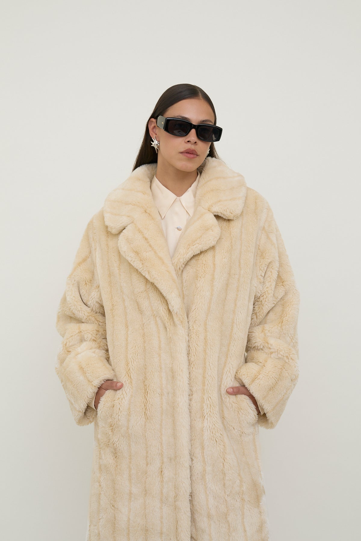 Plush faux fur statement coat