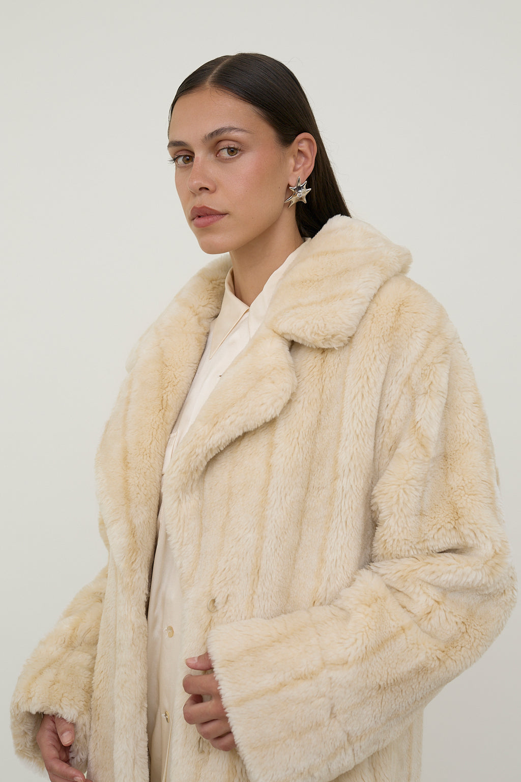 Plush faux fur statement coat