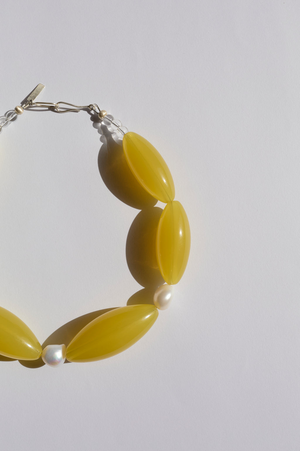 Yellow acetate statement necklace with pearls