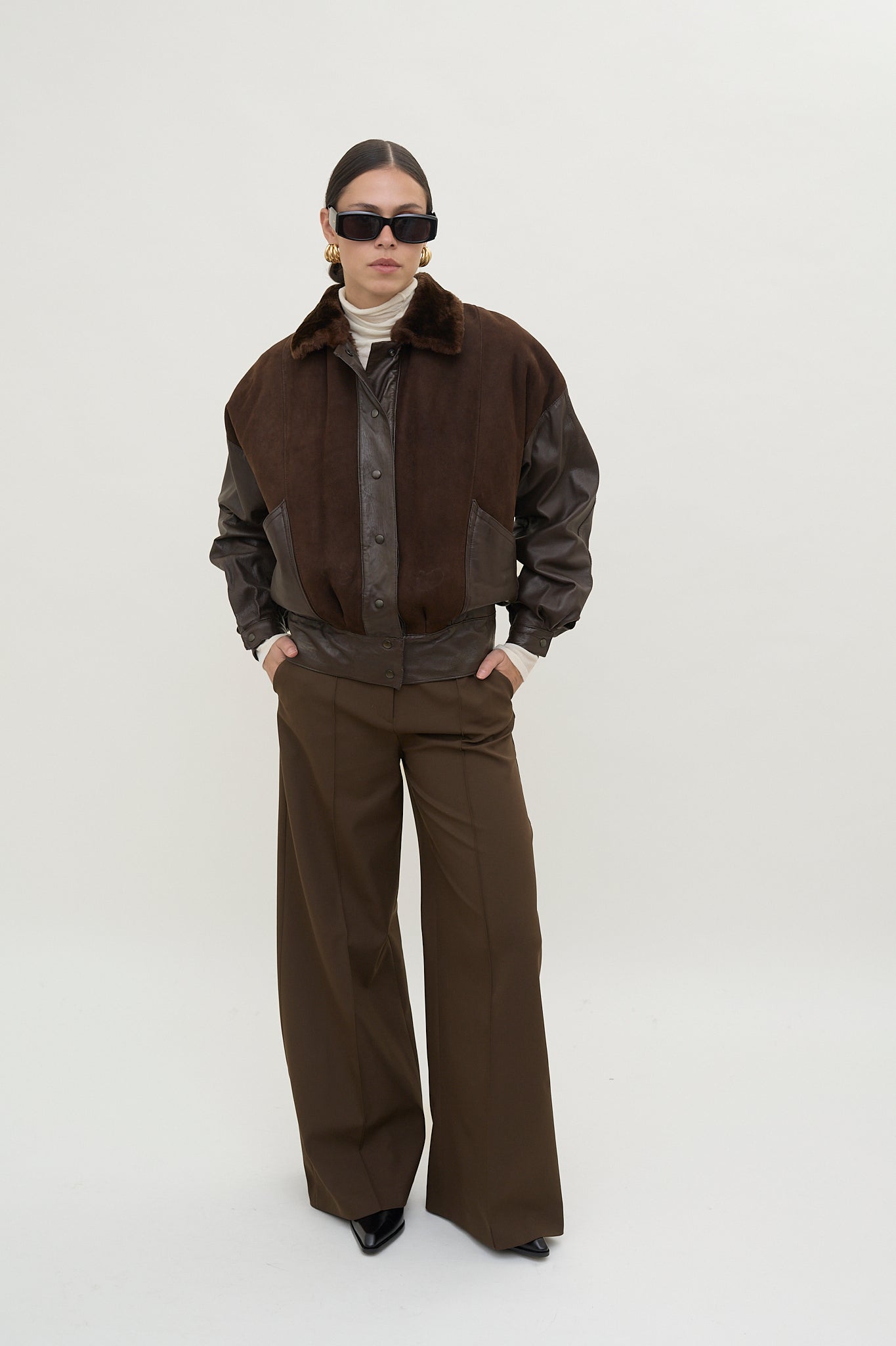 Leather bomber jacket with fur