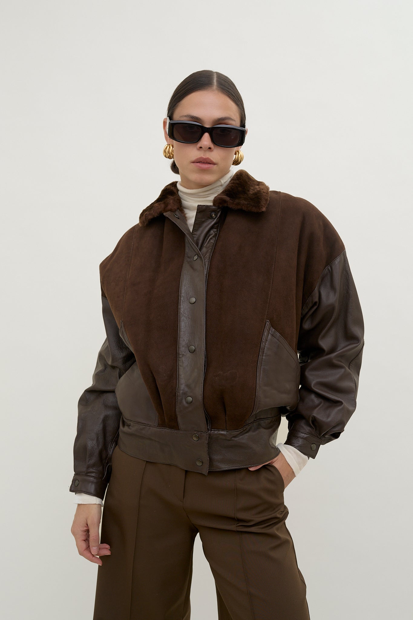 Leather bomber jacket with fur