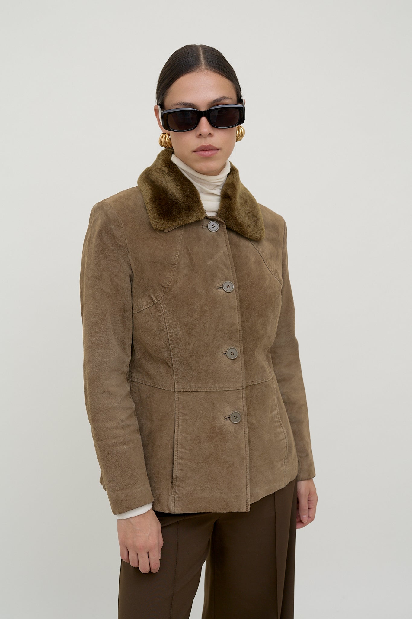 Suede leather jacket with faux fur collar