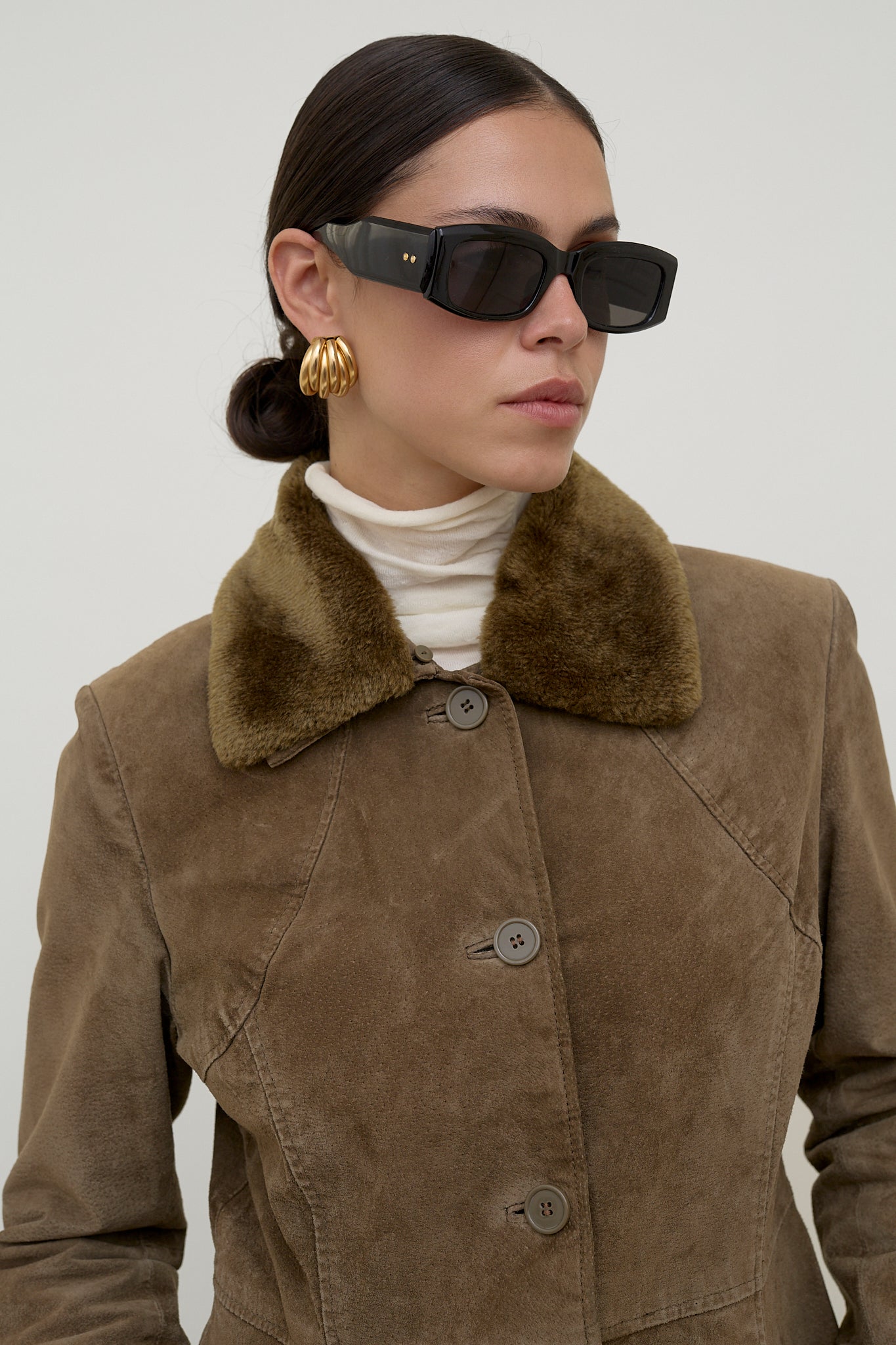 Suede leather jacket with faux fur collar