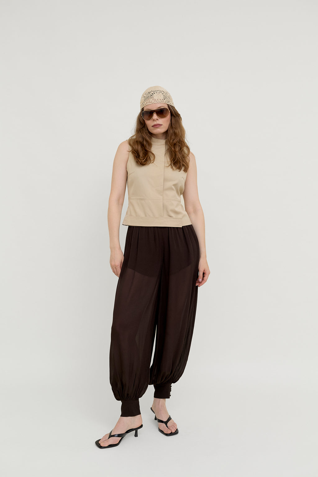 Beige sleeveless structured top