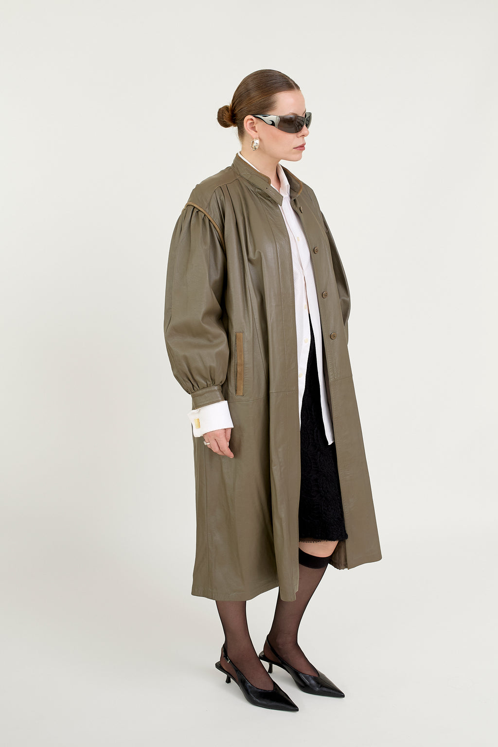 Quilted leather coat with belt