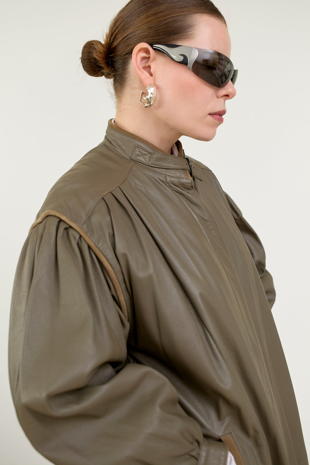 Quilted leather coat with belt