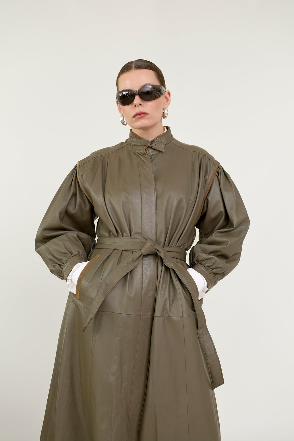 Quilted leather coat with belt