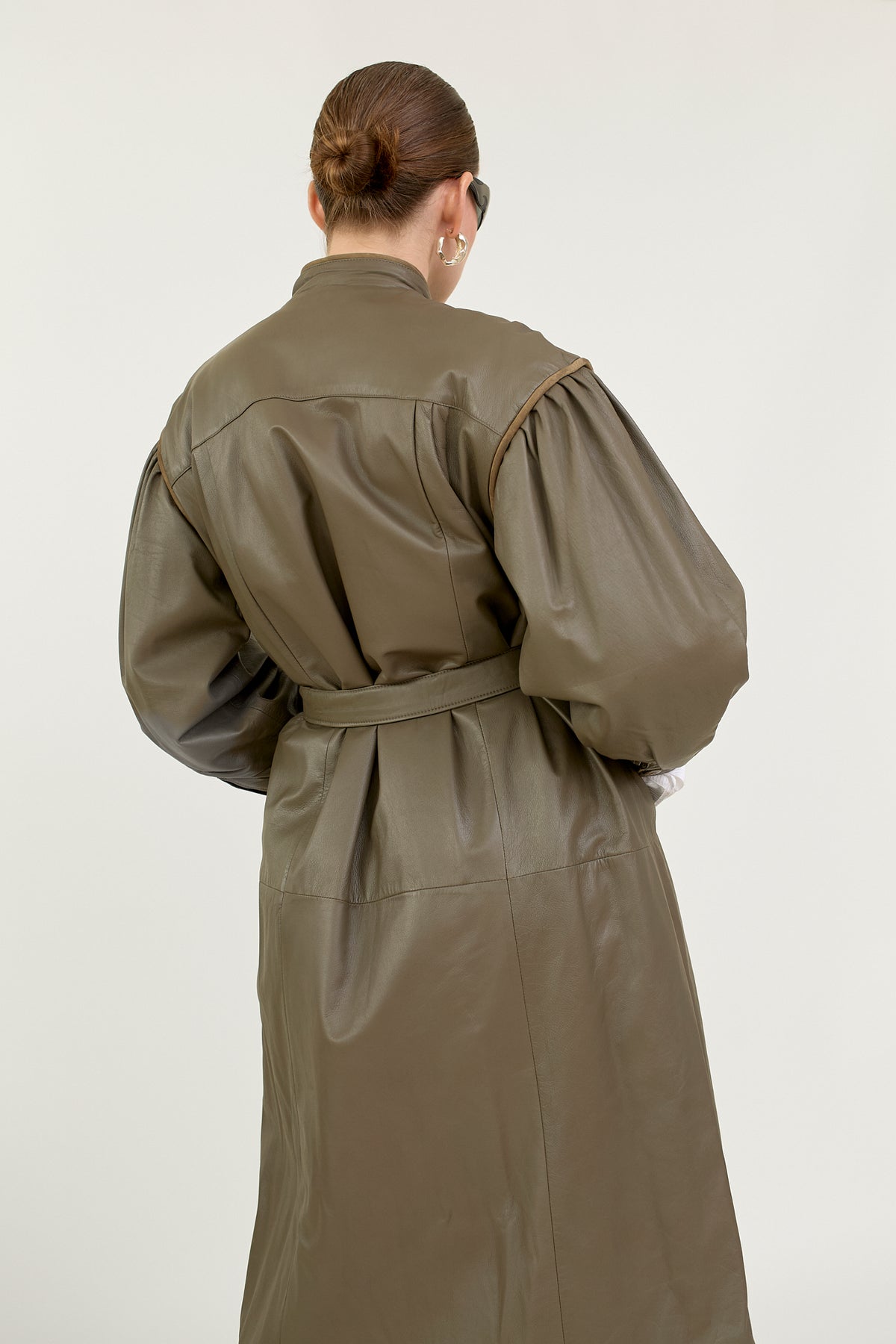 Quilted leather coat with belt