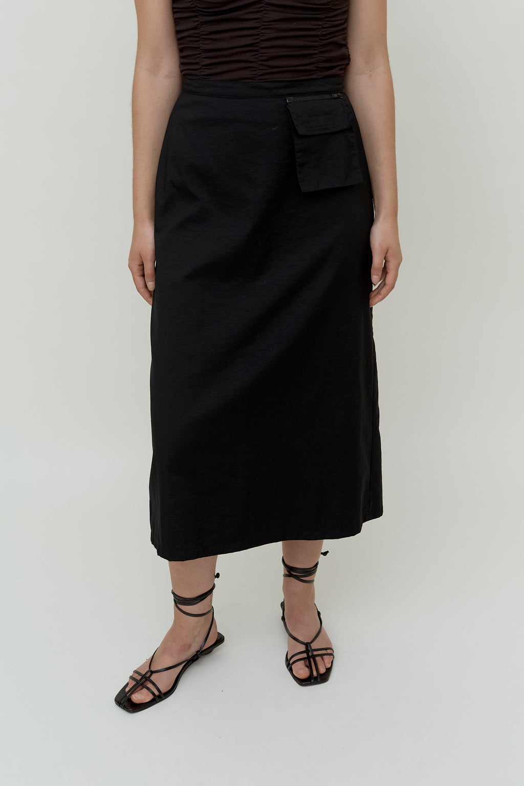 Minimalistic black midi skirt