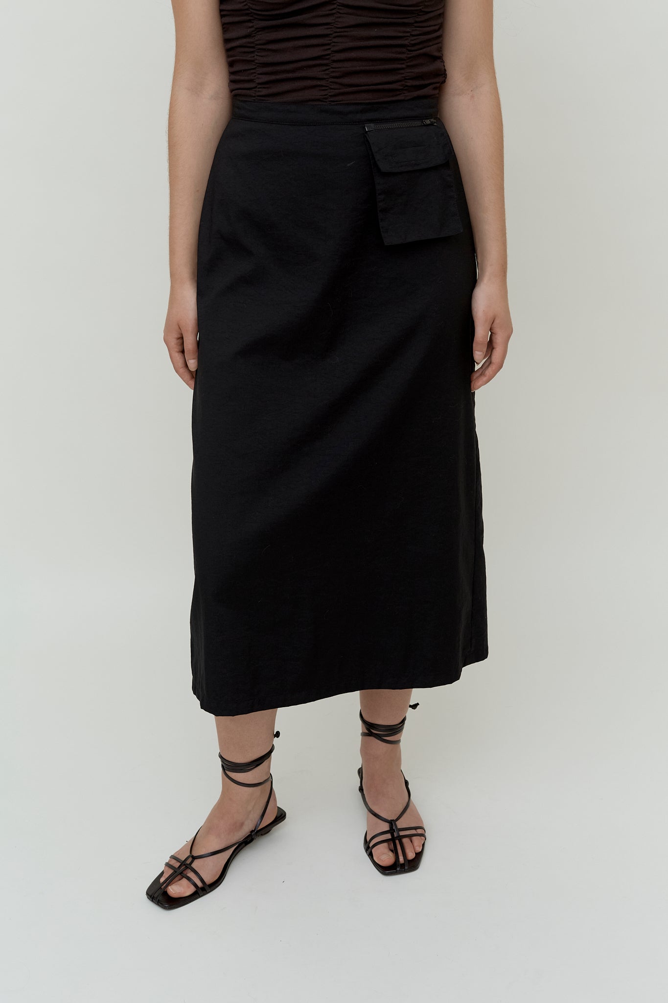 Minimalistic black midi skirt