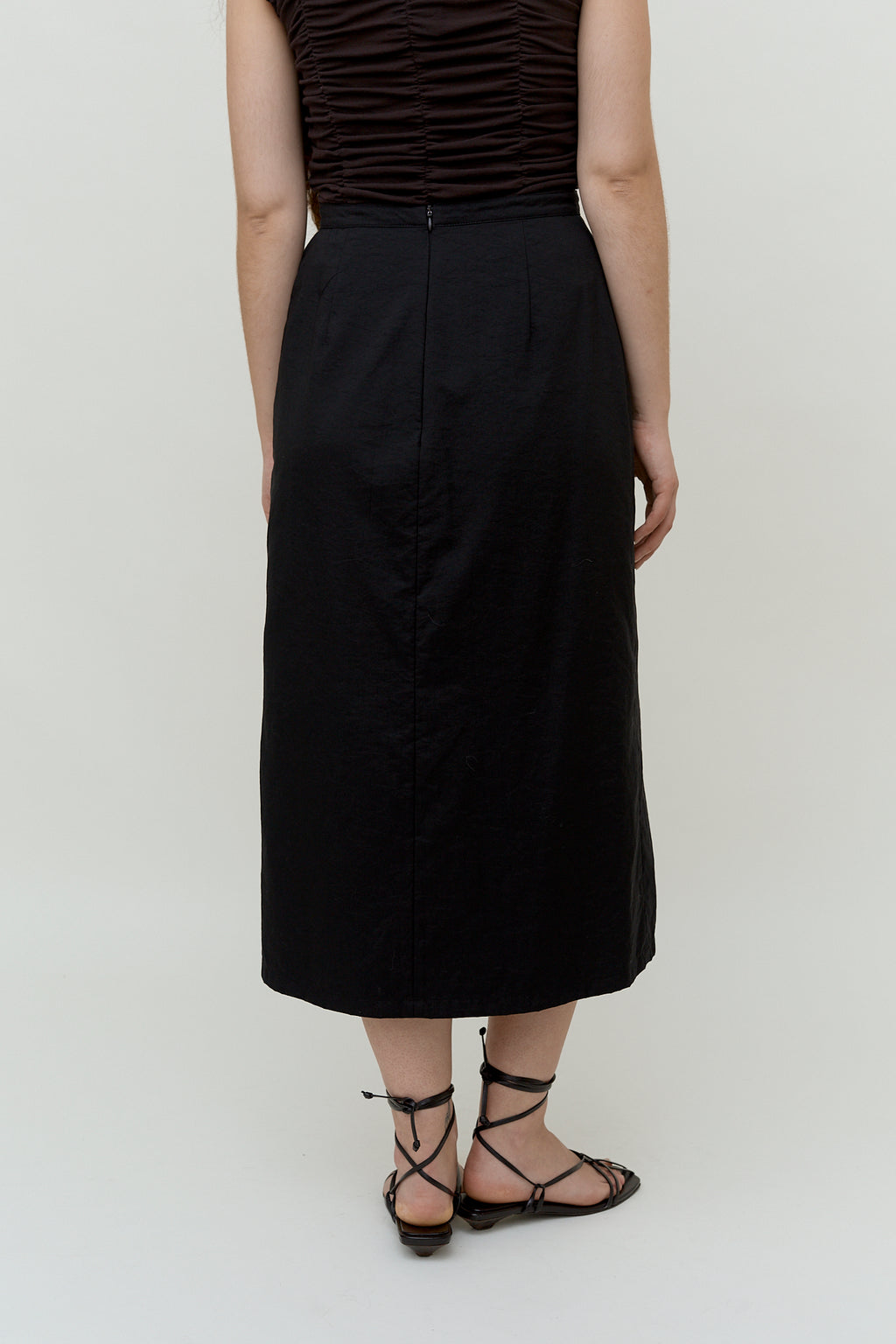 Minimalistic black midi skirt