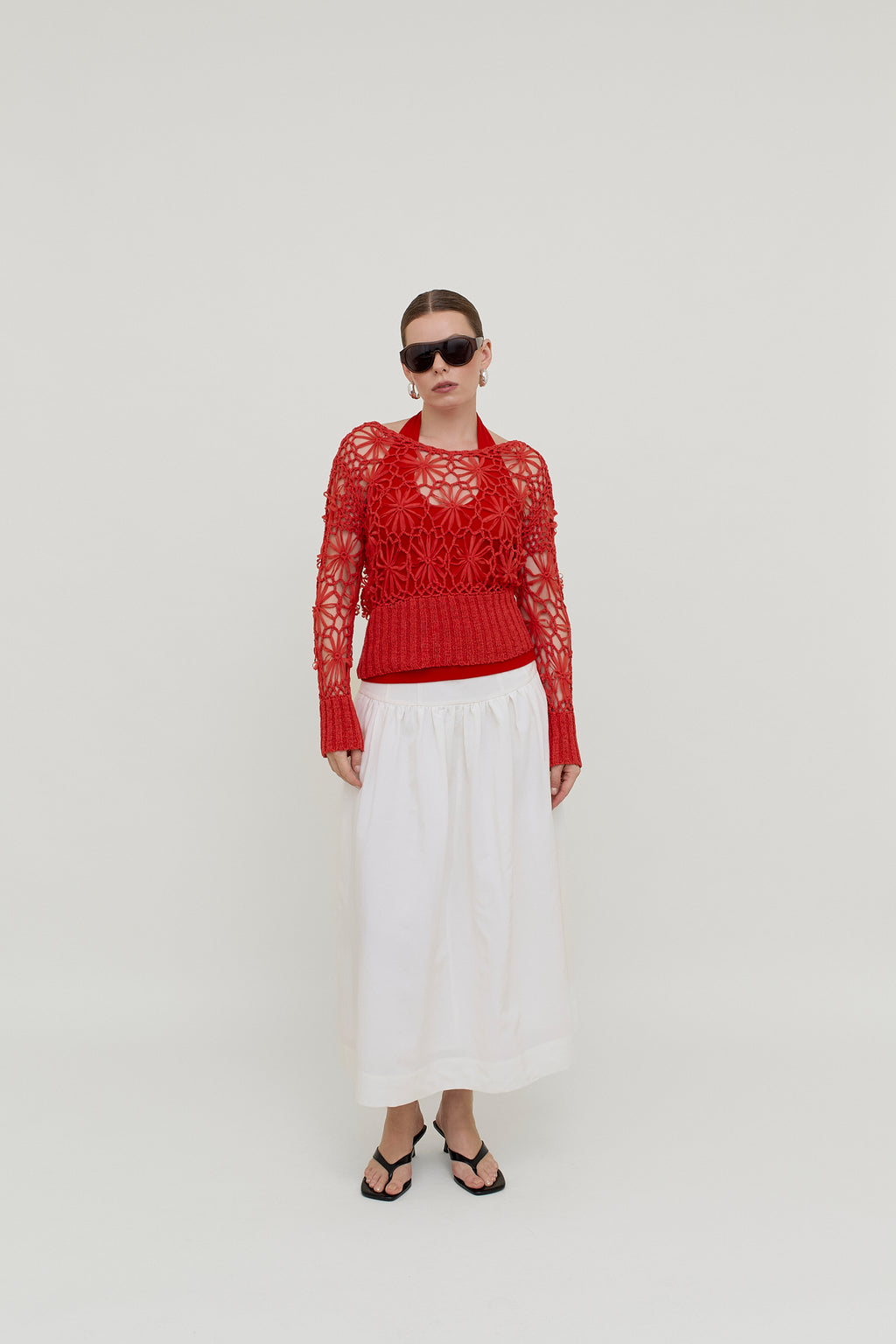 Red crocheted knit top
