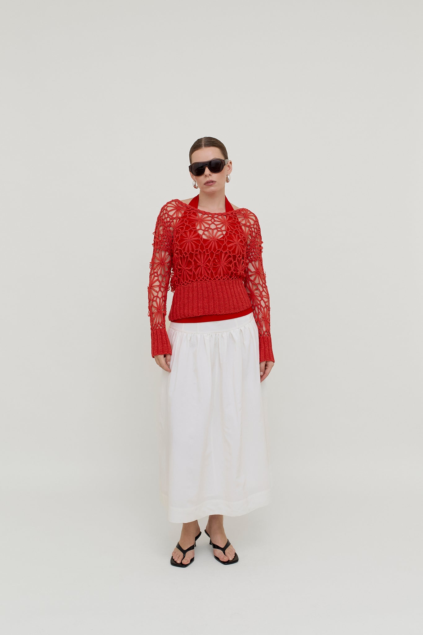 Red crocheted knit top