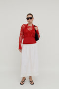Red crocheted knit top