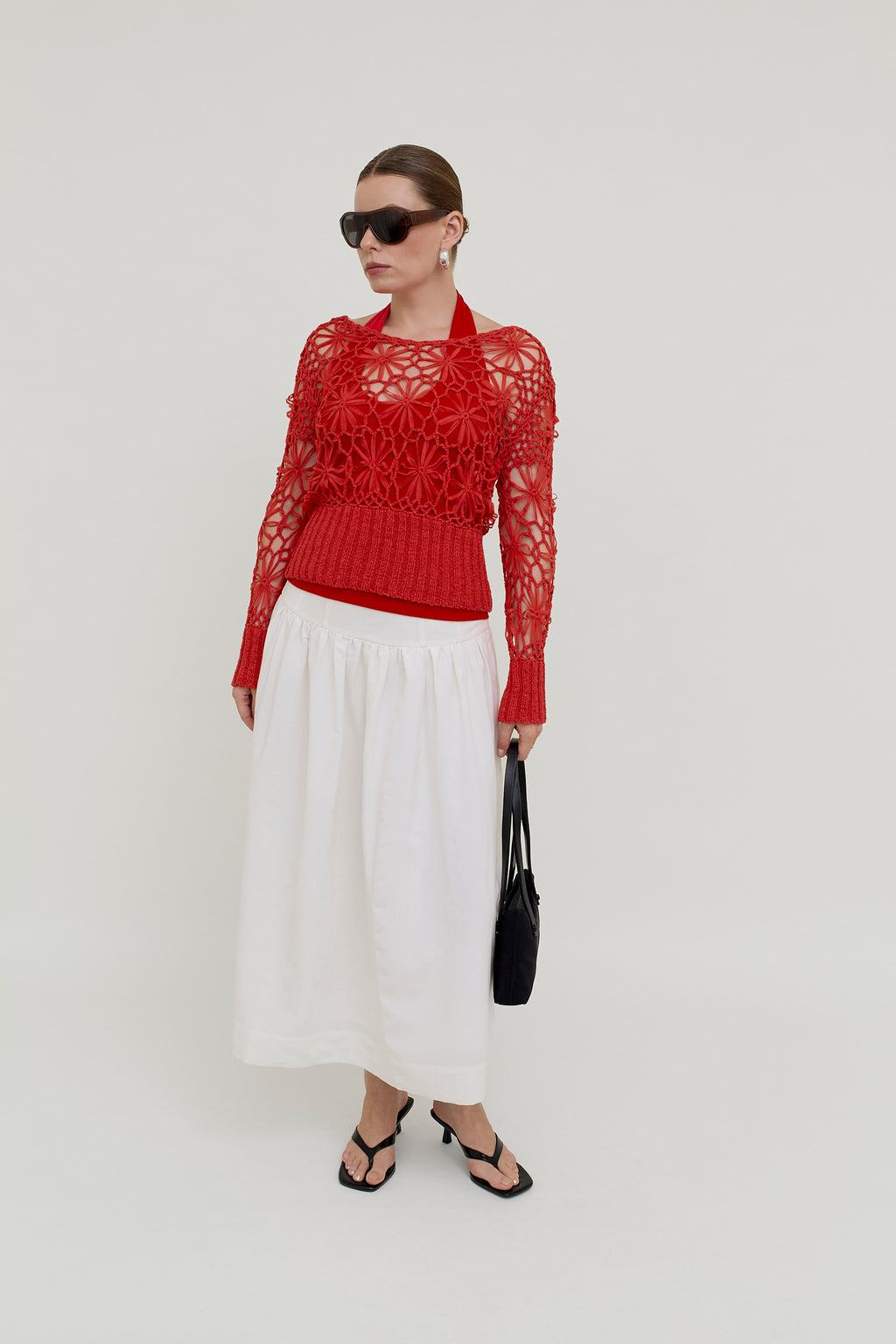Red crocheted knit top