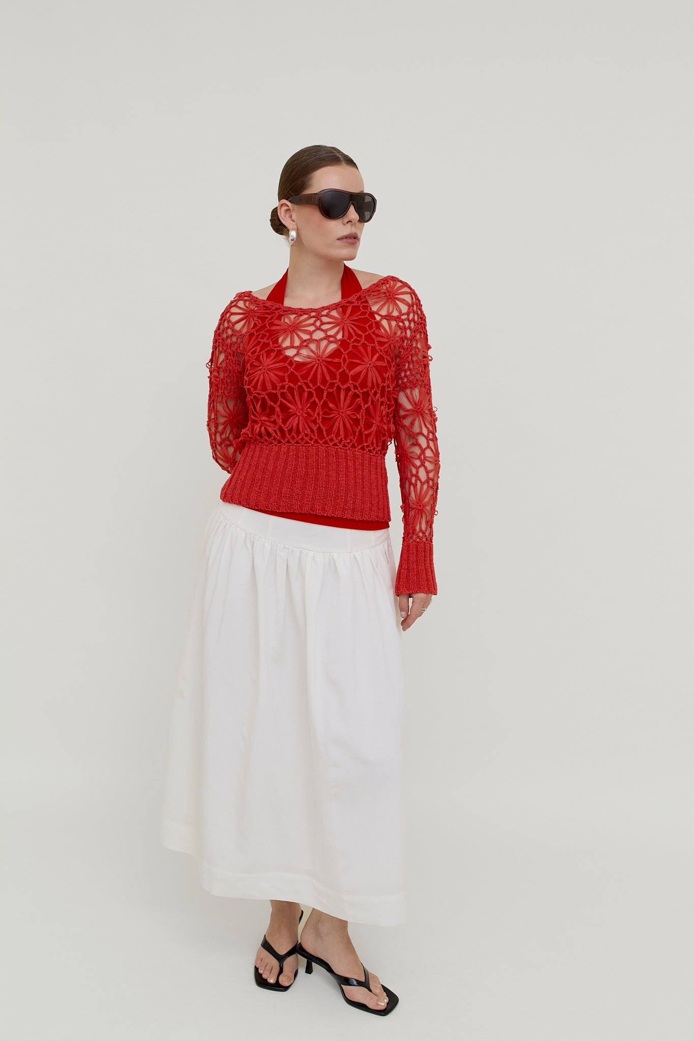 Red crocheted knit top