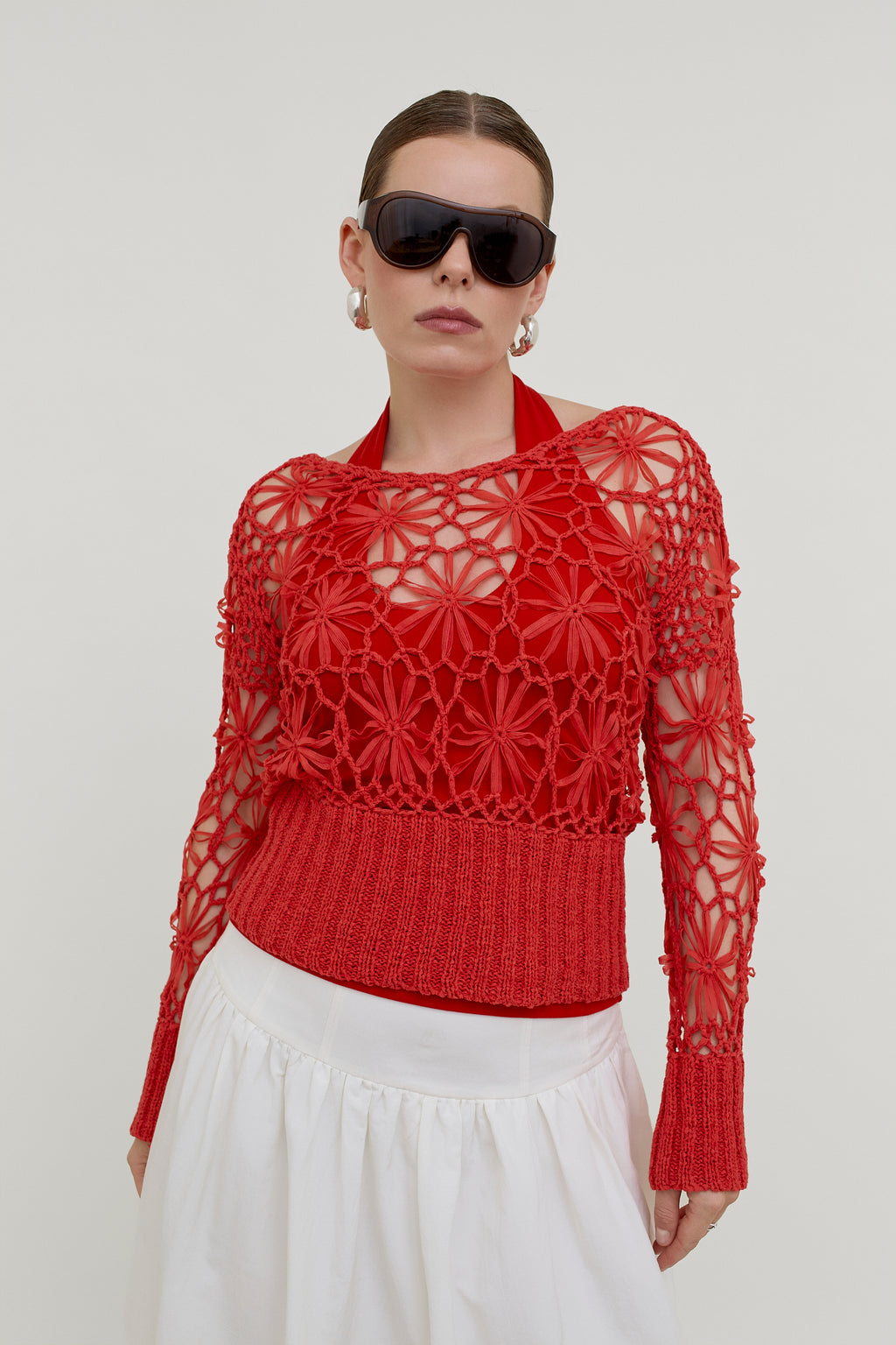 Red crocheted knit top