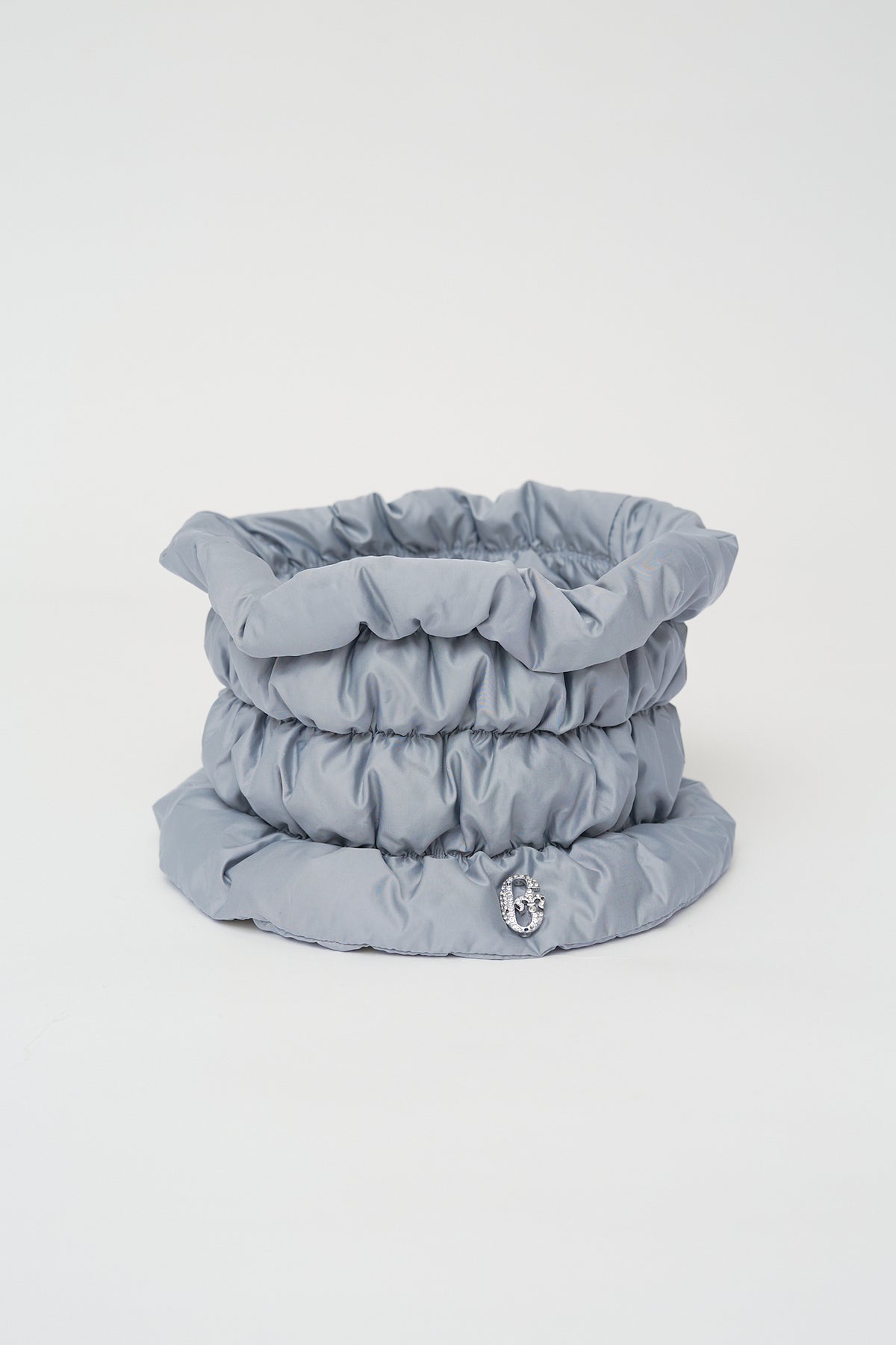 Quilted neck warmer with dawn feathers