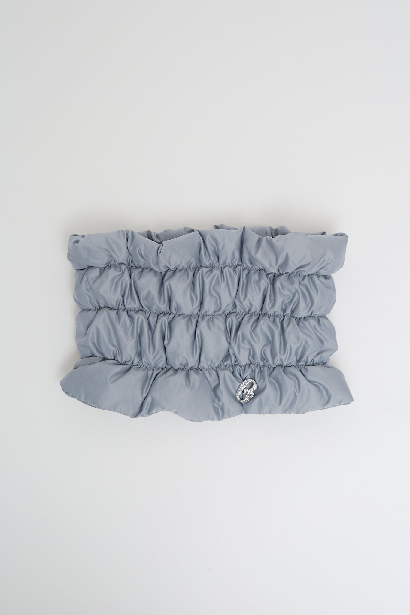 Quilted neck warmer with dawn feathers