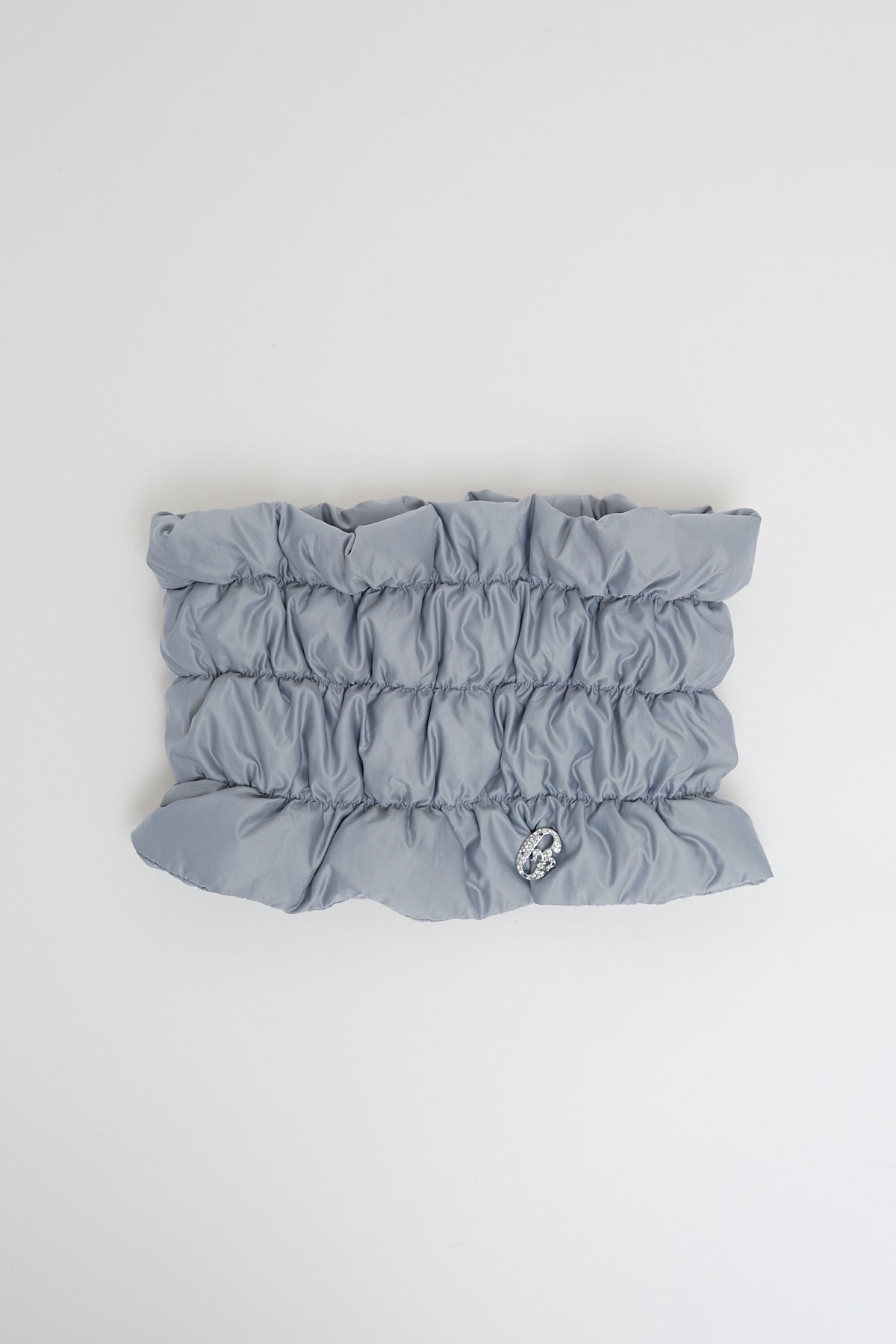 Quilted neck warmer with dawn feathers
