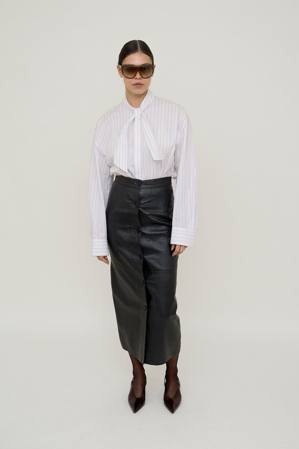 Black tailored leather column skirt
