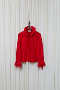 Red silk statement blouse