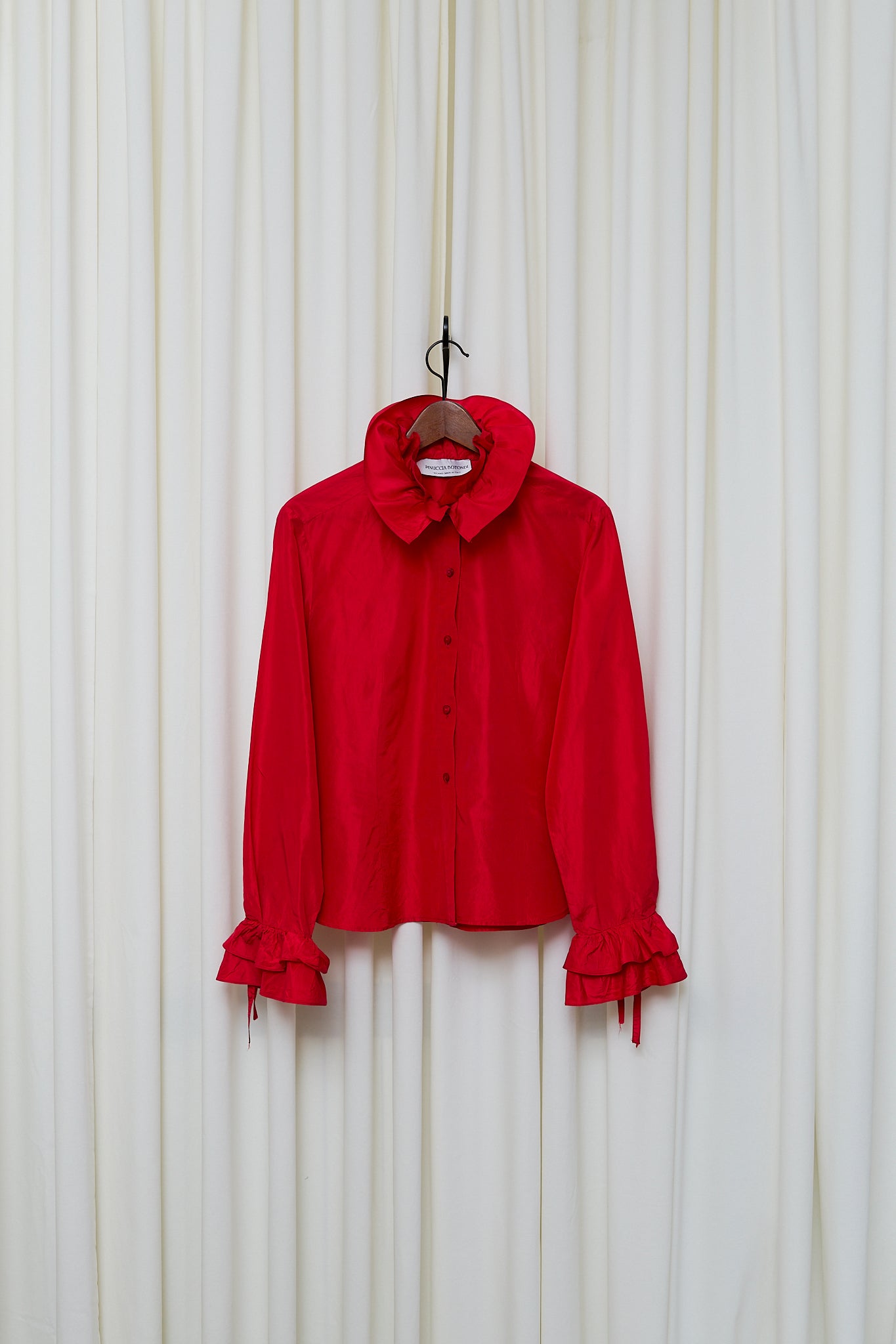 Red silk statement blouse